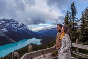 Couple overlooking glacial lake