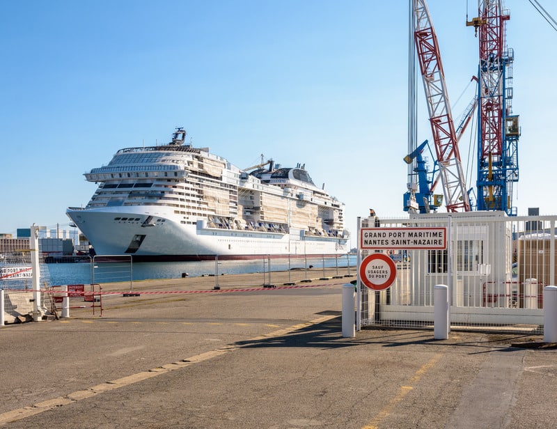Saint-Nazaire, France - September 21, 2022: General view of the MSC Euribia cruise ship under construction in the Chantiers de l'Atlantique shipyard in the Great maritime port of Nantes Saint-Nazaire.