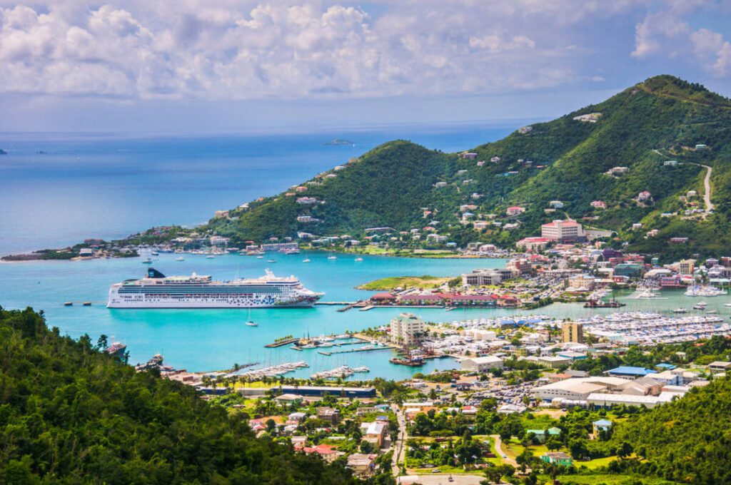 Road Town, Tortola-November 4, 2019-  The luxury cruise ship "Norwegian Gem" is docked in a natural bay  in Road Town, Tortola to allow her passengers a day to visit this tropical island.